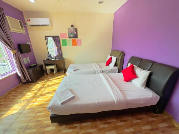 Borneo Inn : photo 3 de la chambre chambre lits jumeaux standard