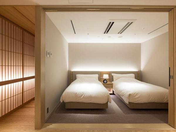 Kinzan : photo 3 de la chambre suite deluxe avec baignoire spa