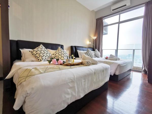 Attic Home Melaka Silverscape Residence & Jonker : photo 7 de la chambre deluxe twin studio (private bathtub and city view)