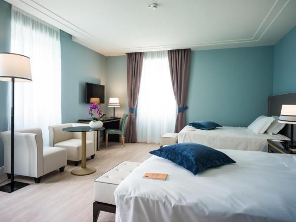 Turin Palace Hotel : photo 1 de la chambre chambre quadruple