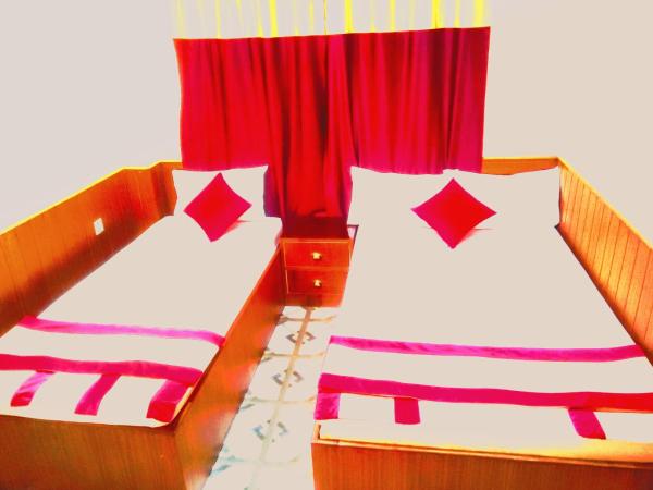 Shri Holy Family Guest House : photo 1 de la chambre chambre triple deluxe