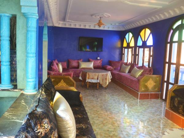 The Sunrise Villa : photo 3 de la chambre chambre familiale - vue sur jardin