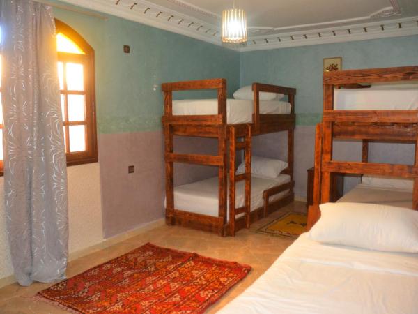 The Sunrise Villa : photo 1 de la chambre chambre familiale - vue sur jardin