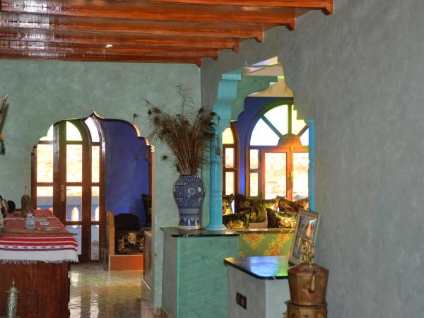 The Sunrise Villa : photo 2 de la chambre chambre quadruple - vue sur jardin