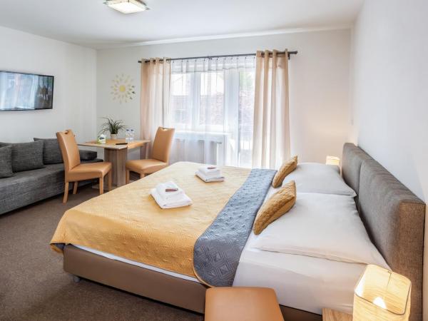 Elendris - Ubytování u kostela : photo 1 de la chambre chambre deluxe double ou lits jumeaux