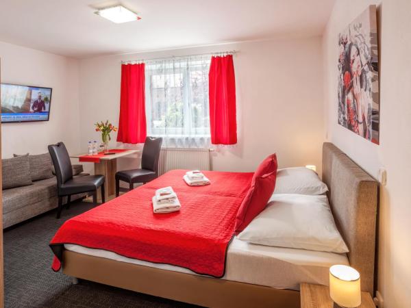 Elendris - Ubytování u kostela : photo 3 de la chambre chambre deluxe double ou lits jumeaux