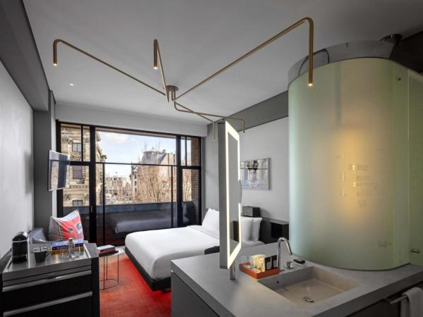 W Amsterdam : photo 2 de la chambre chambre wonderful exchange avec 1 lit king-size - vue sur ville