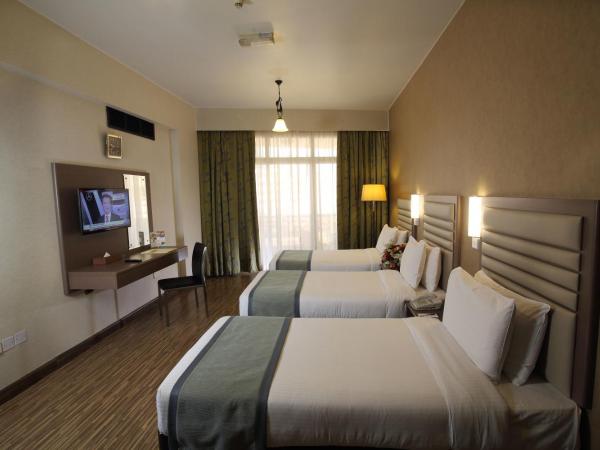 Wave International Hotel : photo 10 de la chambre chambre triple standard