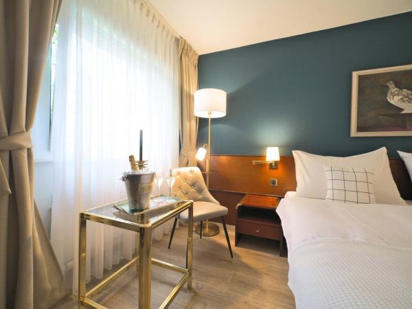 Tulip Inn Beaulieu Lausanne : photo 2 de la chambre chambre lits jumeaux supérieure