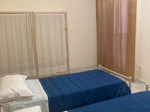 sentiti a casa-guest house : photo 1 de la chambre chambre lits jumeaux