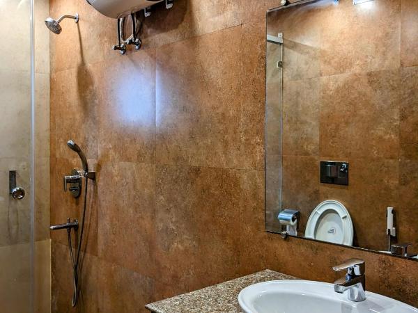 The Aster Enclave Hotel : photo 4 de la chambre chambre lit king-size supérieure