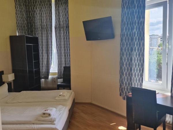 Hotel Am Stuttgarter Eck : photo 3 de la chambre chambre triple confort