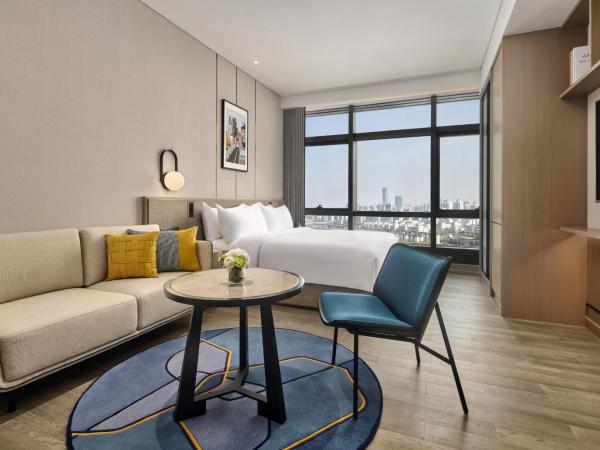 Artyzen Habitat Taopu Shanghai : photo 5 de la chambre chambre lit queen-size