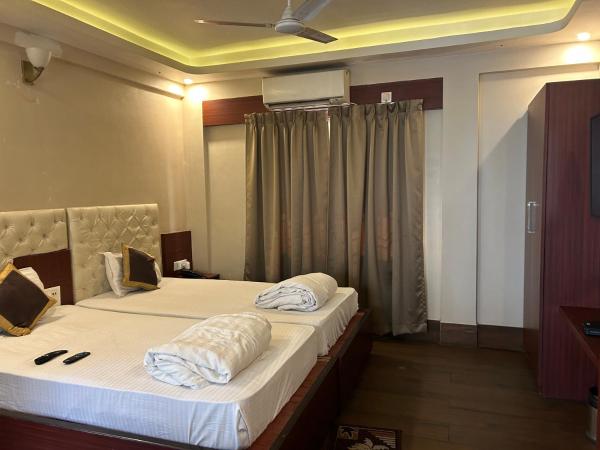 The Aster Enclave Hotel : photo 9 de la chambre chambre lit king-size supérieure