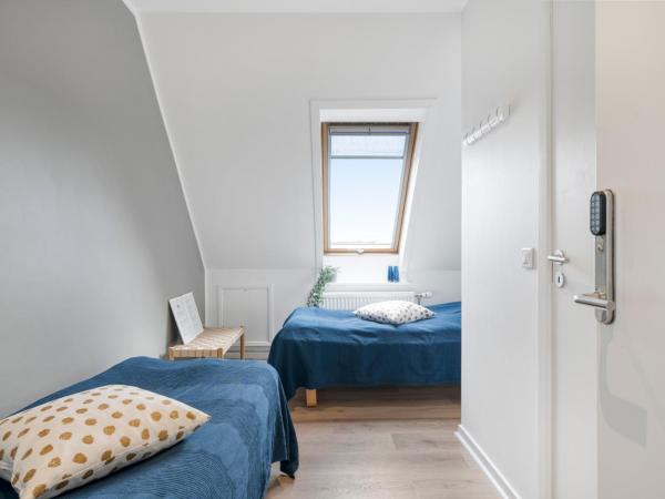 Kragsbjerggaard Vandrerhjem : photo 3 de la chambre chambre lits jumeaux avec salle de bains privative