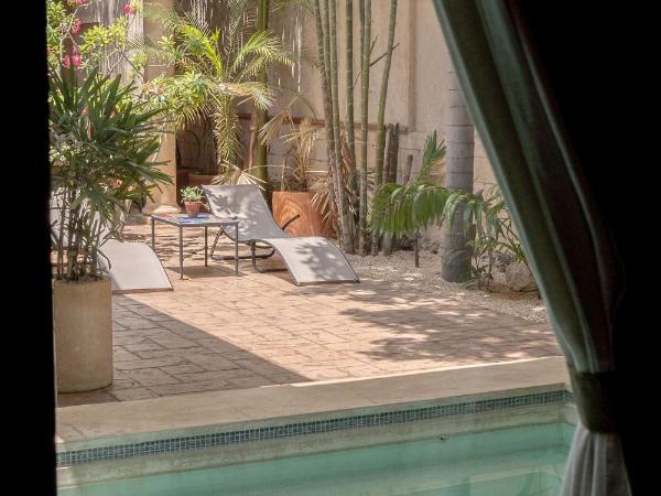 Casa Dos Lirios Hotel Boutique : photo 3 de la chambre chambre lit king-size - vue sur piscine