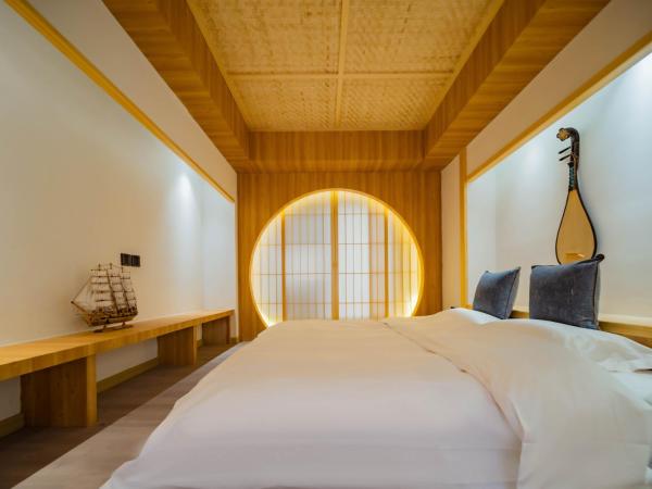 Joke Inn : photo 10 de la chambre courtyard view comfort two-bedroom suite - anfu