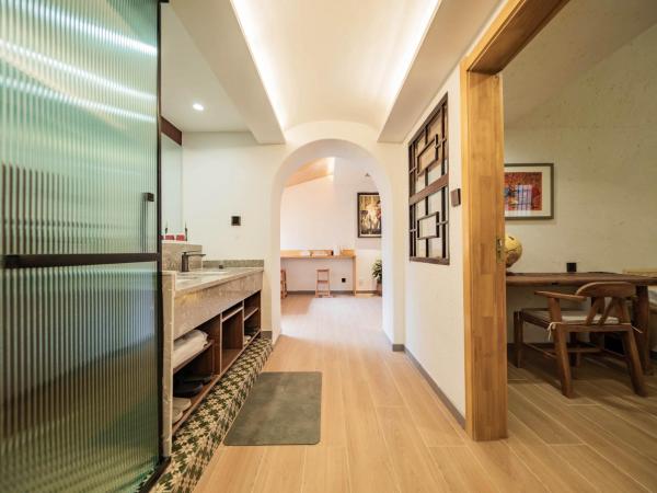 Joke Inn : photo 5 de la chambre courtyard view comfort two-bedroom suite - anfu