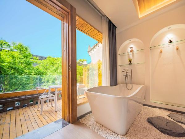 Joke Inn : photo 1 de la chambre walled city view bathtub suite - hanguang