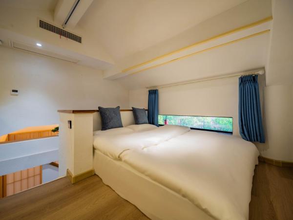 Joke Inn : photo 5 de la chambre duplex atrium view suite - anshang