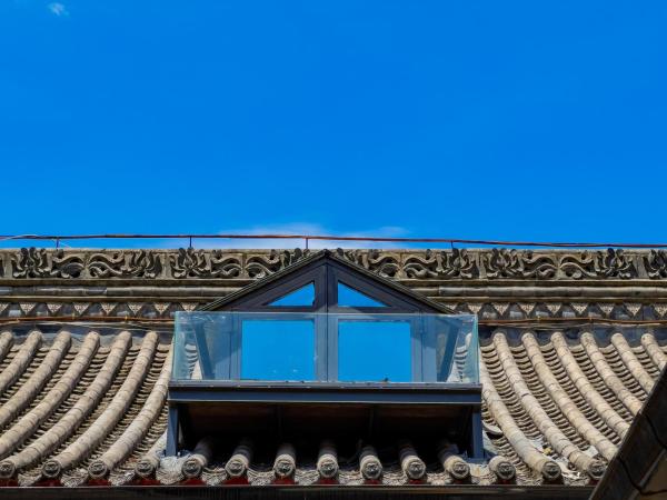 Joke Inn : photo 6 de la chambre walled city view parent-child suite - chengtian