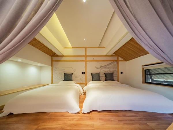 Joke Inn : photo 5 de la chambre walled city view parent-child suite - chengtian