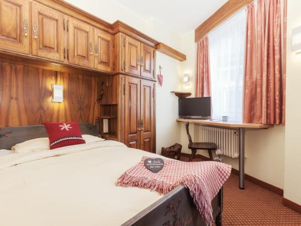 Le Petit CHARME-INN : photo 2 de la chambre chambre simple