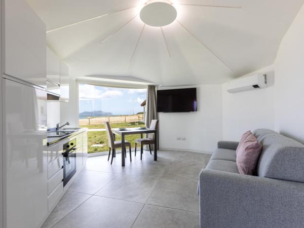 Baia del Sole Resort : photo 2 de la chambre appartement - vue sur mer