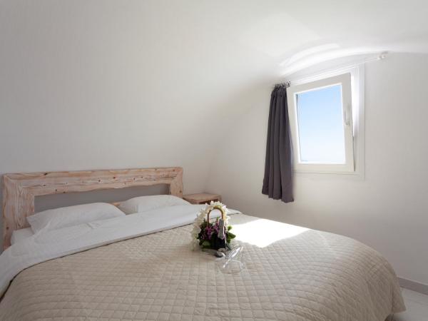 Caldera Butterfly Villas : photo 10 de la chambre chambre triple