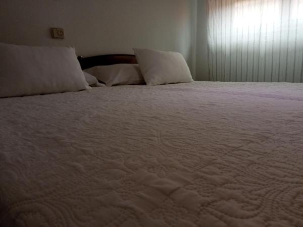 Hostal Cuzco : photo 4 de la chambre chambre lits jumeaux