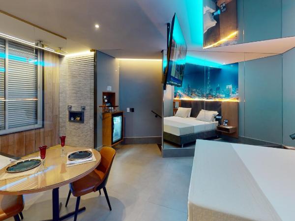 Motel DUBAI BH : photo 9 de la chambre suite avec piscine privée