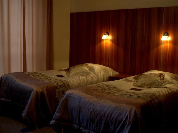 Warsaw Apartments Magnolie : photo 5 de la chambre chambre lits jumeaux