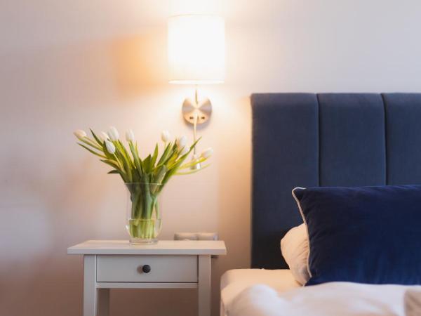 H Villa Herkules : photo 4 de la chambre chambre triple deluxe