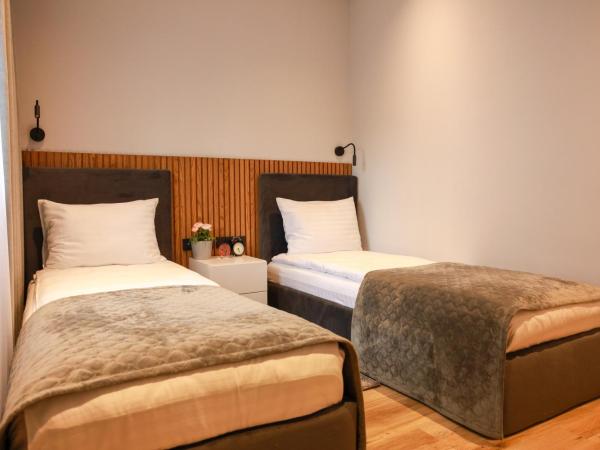 Apart-hotel Dream : photo 4 de la chambre chambre lits jumeaux avec salle de bains