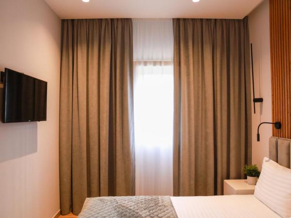 Apart-hotel Dream : photo 6 de la chambre chambre double deluxe avec douche