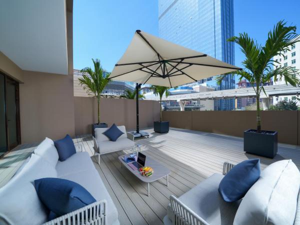 Cheval Maison - The Palm : photo 3 de la chambre appartement 1 chambre de luxe avec terrasse