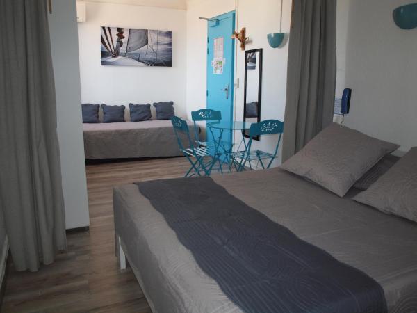 Hôtel Restaurant - Villa Les Sirènes : photo 4 de la chambre chambre triple basique