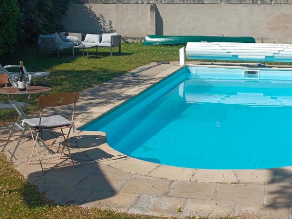 Le Magnolia, chambre d'hôte au calme : photo 2 de la chambre chambre double - vue sur piscine