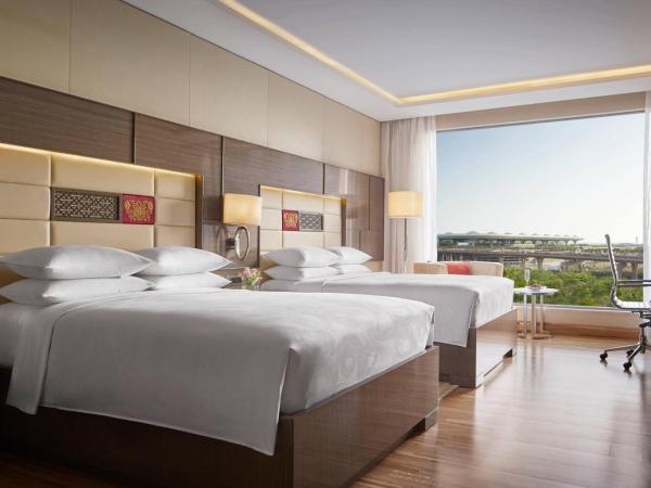 JW Marriott Mumbai Sahar Airport : photo 4 de la chambre chambre avec 2 lits doubles - vue sur ville