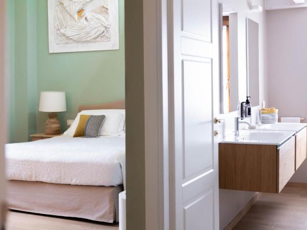 Sella&Mosca Casa Villamarina : photo 7 de la chambre chambre quadruple supérieure