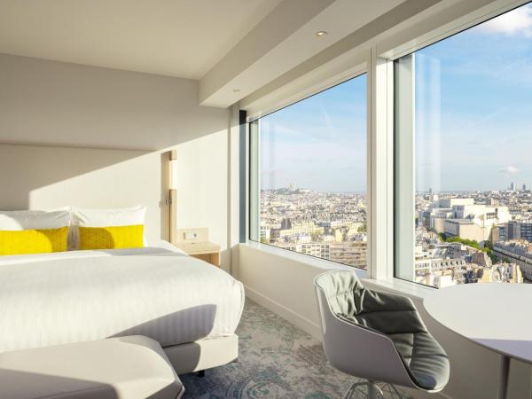 Courtyard by Marriott Paris Gare de Lyon : photo 1 de la chambre chambre lit king-size - vue sur sacré-cœur