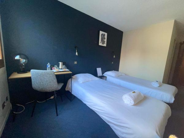 Cit'Hôtel le Welcome : photo 3 de la chambre chambre lits jumeaux