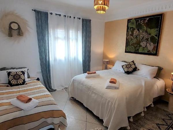 CASA ZOUINA : photo 4 de la chambre chambre triple avec salle de bains