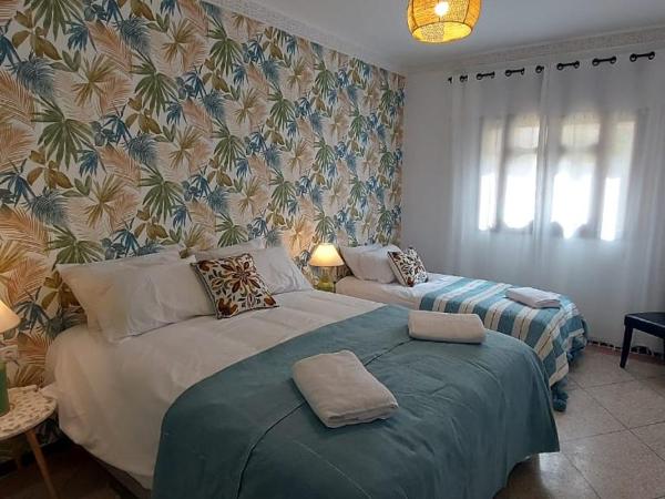 CASA ZOUINA : photo 5 de la chambre chambre triple avec salle de bains