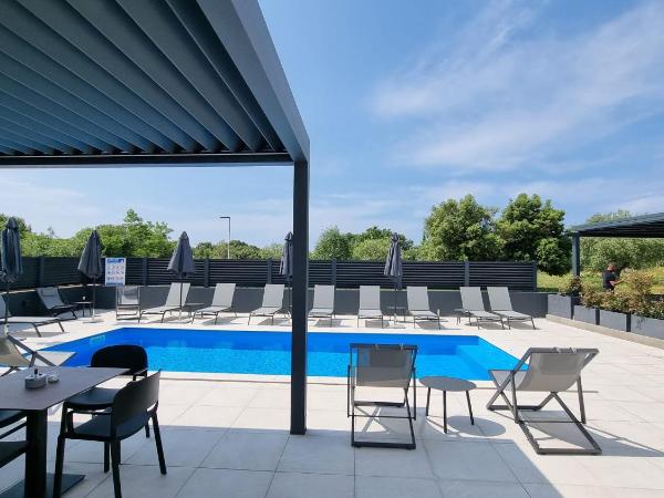 Luxury Residence Levante : photo 3 de la chambre chambre lit king-size deluxe