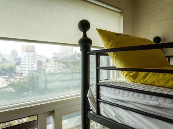 24 Guesthouse Dongdaemun Market : photo 2 de la chambre chambre lits jumeaux