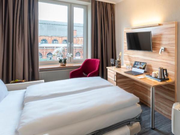 PLAZA Premium Columbus Bremen : photo 2 de la chambre chambre familiale