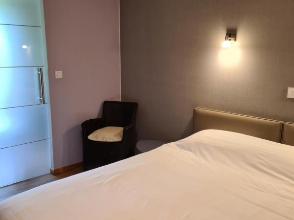 La Maison Thimadaise : photo 3 de la chambre chambre double ou lits jumeaux deluxe – vue sur jardin