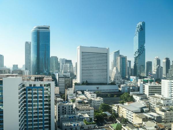 Le Meridien Bangkok : photo 8 de la chambre chambre d'angle deluxe avec 1 lit king-size 