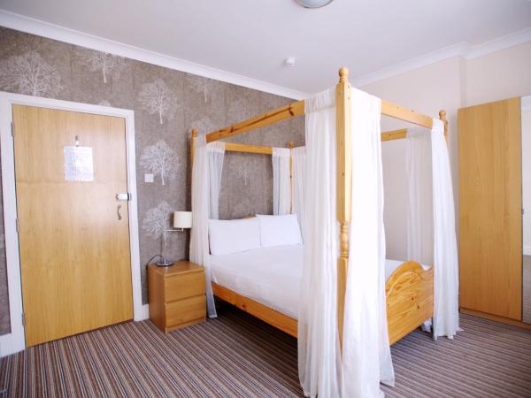Ashley Victoria : photo 2 de la chambre chambre double avec lit à baldaquin